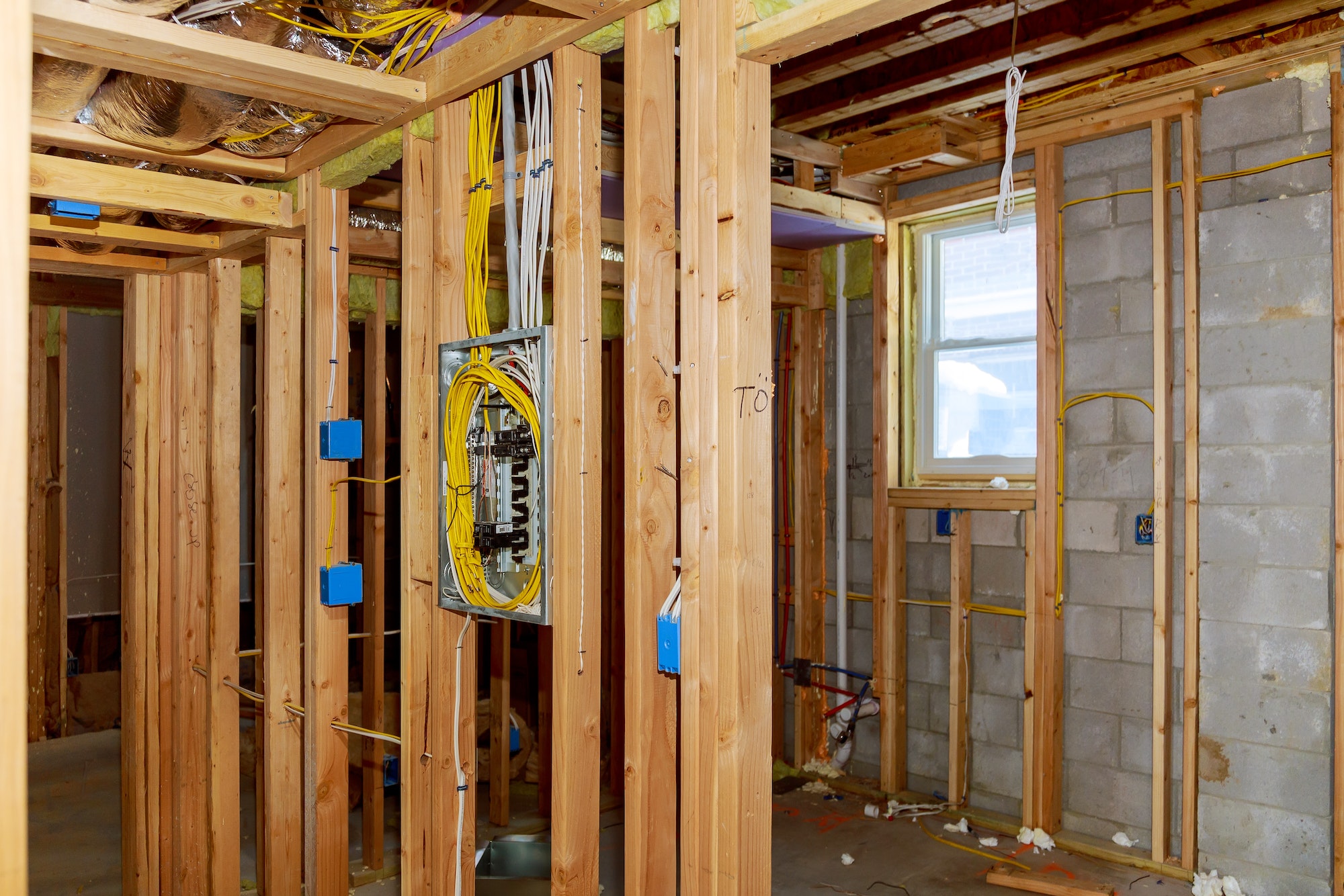 Interior framing of a new house under construction construction home framing