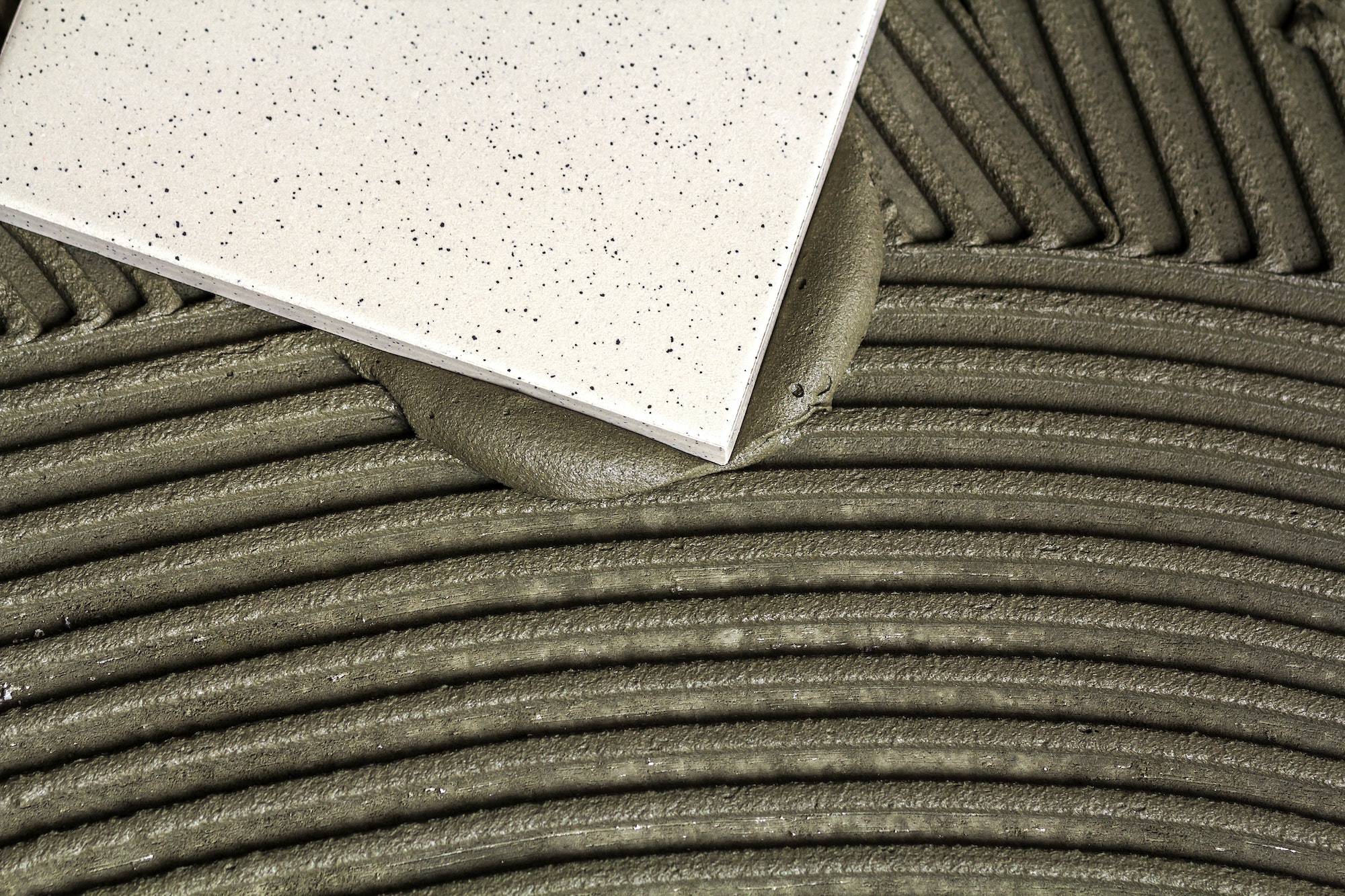 Ceramic tiles and tools for tiler. Floor tiles installation. Home improvement, renovation - ceramic