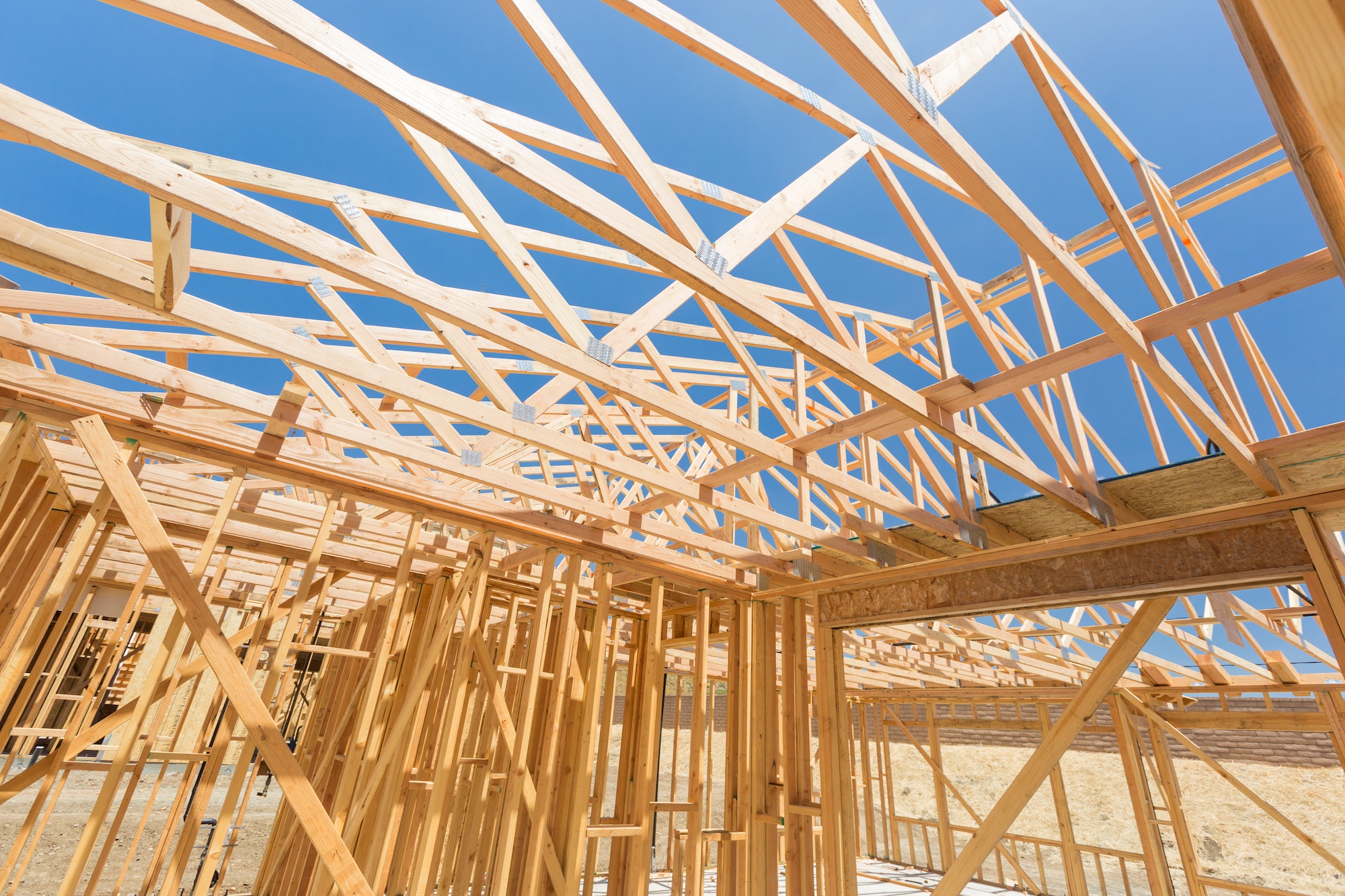 Wood Home Framing Abstract At Construction Site.